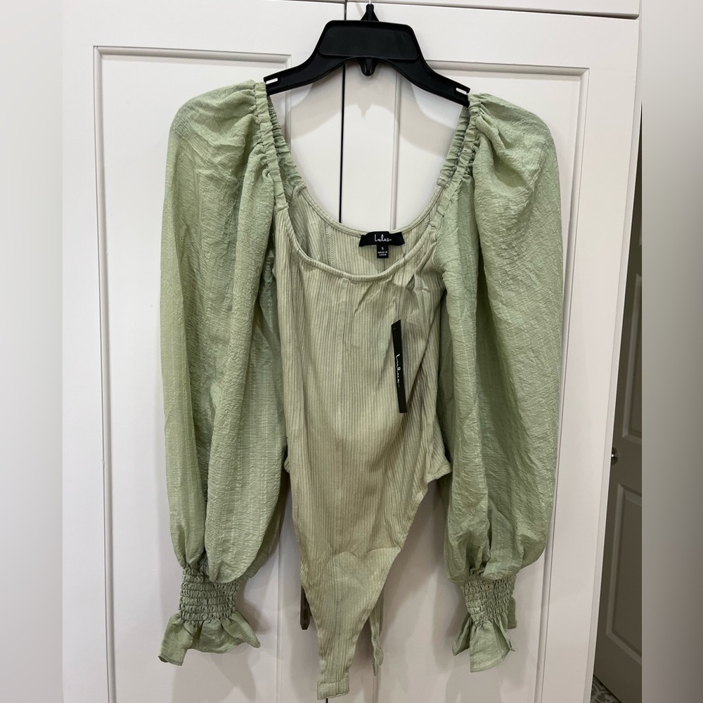 Sage green one piece from Lulu’s